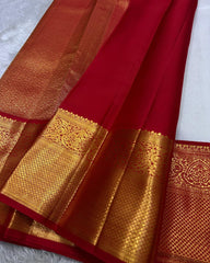 Varnika – Red Kanjivaram Silk Saree with Emerald Zari Border