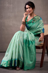 Effulgent Turquoise Cotton Silk Saree With Lustrous Blouse Piece