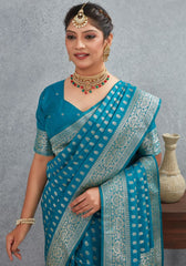 Charmi Teal Blue Banarasi Soft Silk Saree