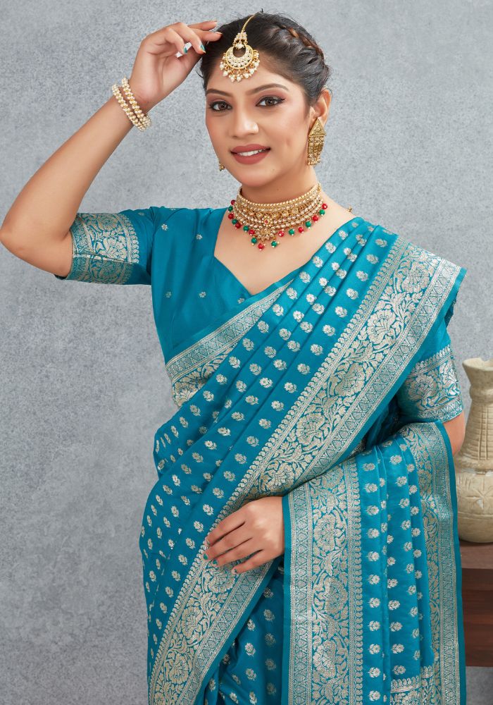 Charmi Teal Blue Banarasi Soft Silk Saree