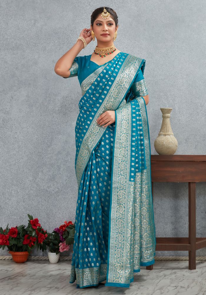 Charmi Teal Blue Banarasi Soft Silk Saree