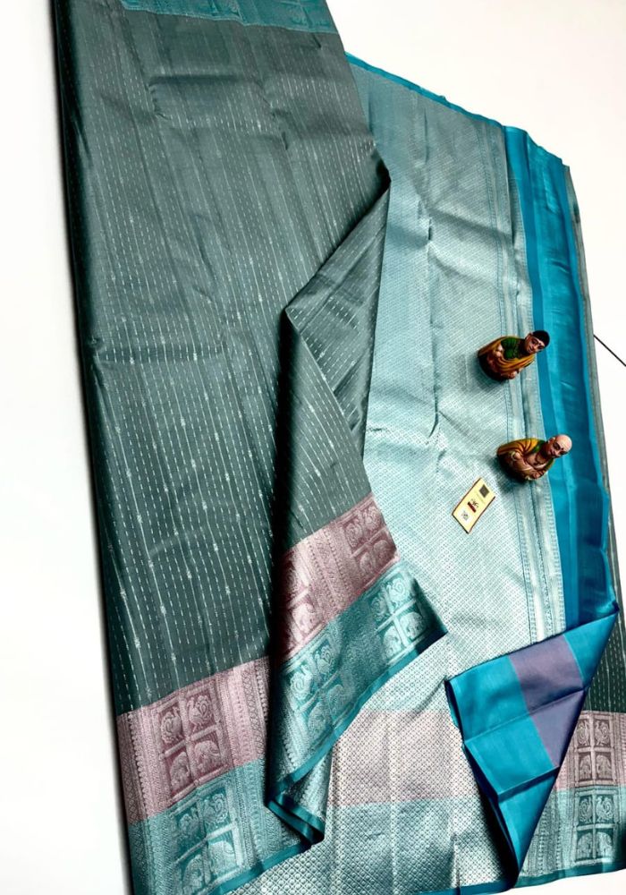 Ishira – Aqua Teal Kanjivaram Silk Saree with Silver Weaving