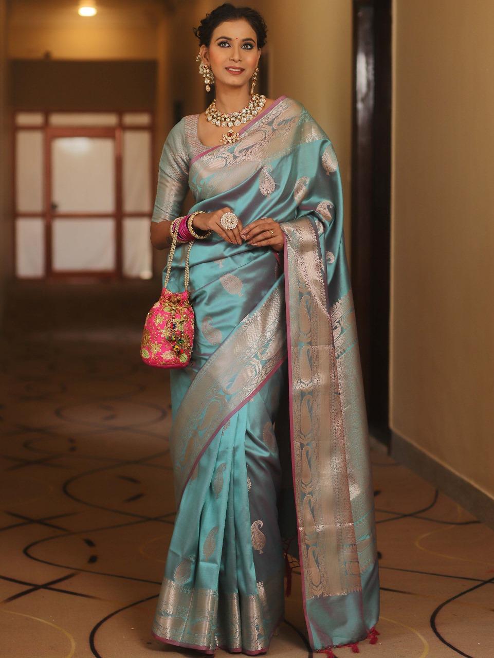 Mrinalini – Sky Blue Banarasi Silk Saree with Golden Paisley Weaving