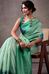 Effulgent Turquoise Cotton Silk Saree With Lustrous Blouse Piece
