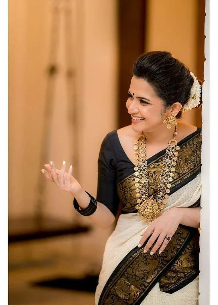 Richa White Banarasi Silk Saree with Black Zari Pallu